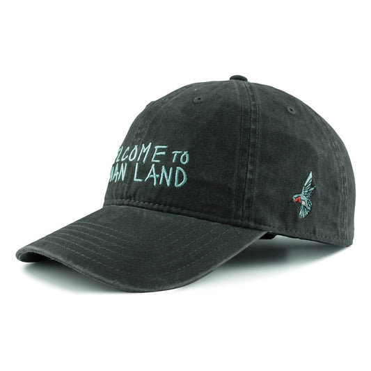 Black cap with 'Welcome to Indian Land' embroidered text in blue and colorful hummingbird Urban Native era logo