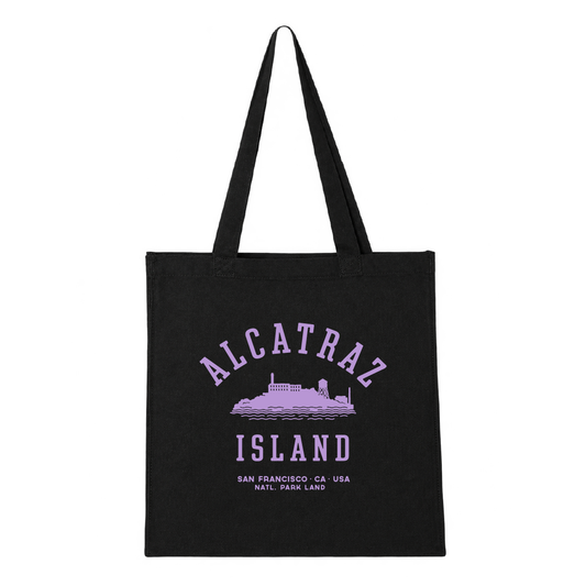 Black tote bag with purple Alcatraz Island design and screenprint, limited edition by the Golden Gate National Parks Conservancy.