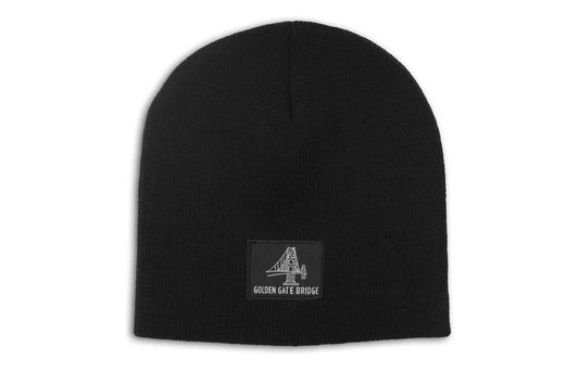 Black knit cap with black and white woven Golden Gate Bridge logo.