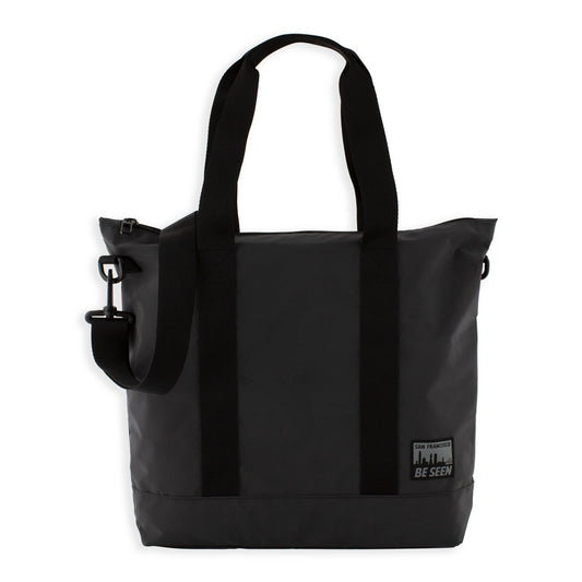 Reflective charcoal grey tote bag with black and grey San Francisco Be Seen logo.